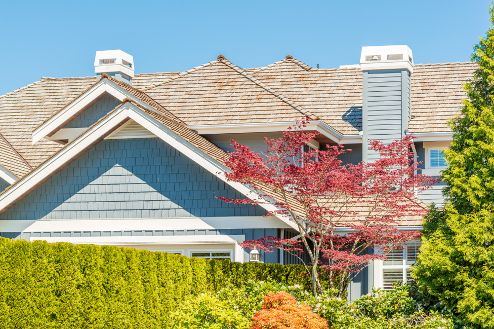 Aerial view of new homes symbolizing rising real estate costs
