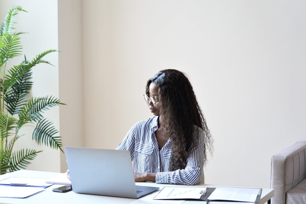 Young businesswoman considering mortgage refinance options