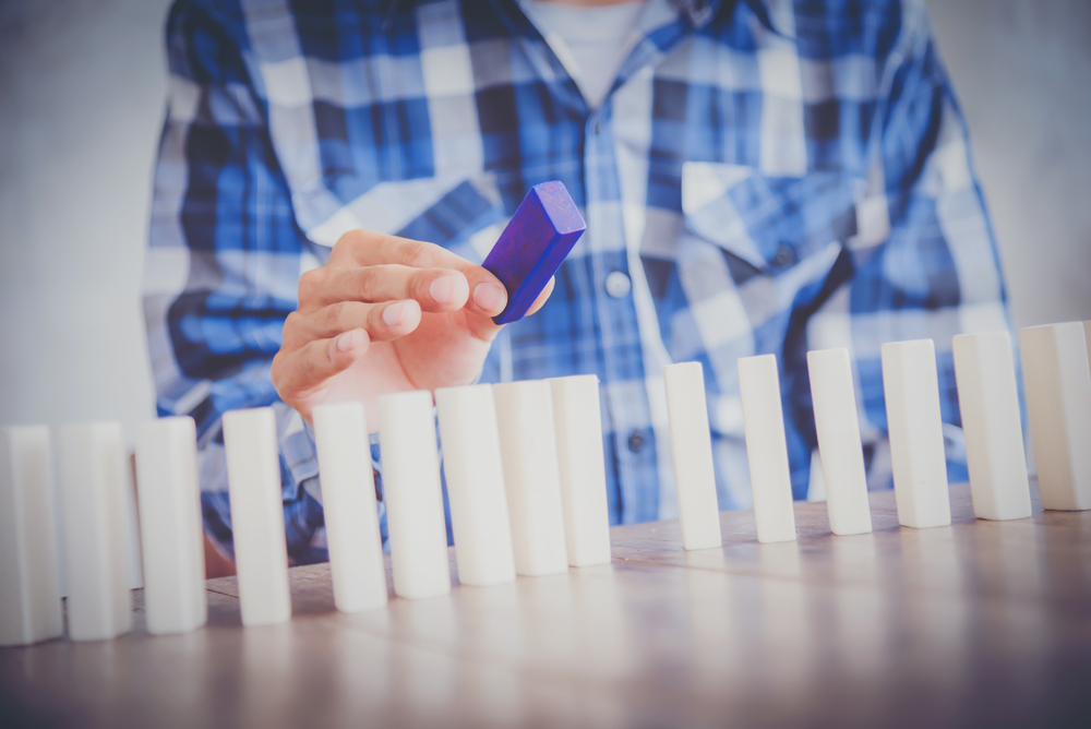 Man choosing from stock options