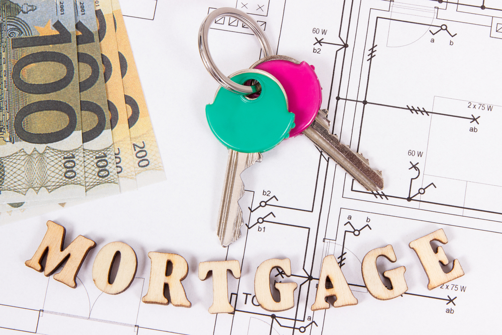 Home keys and currencies - mortgage refi concept