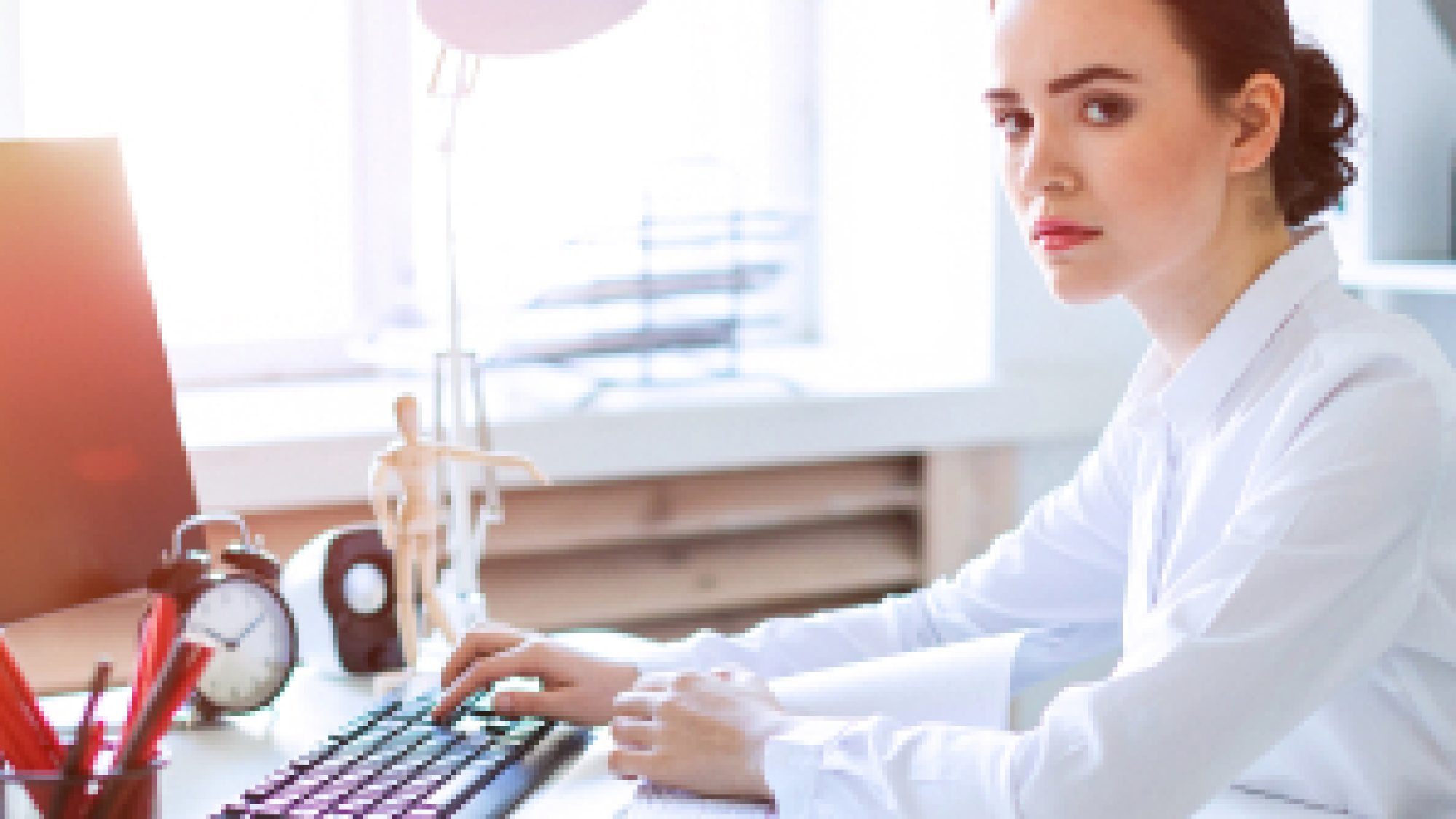 Young,Girl,In,The,Office,Working,With,Documents,At,The