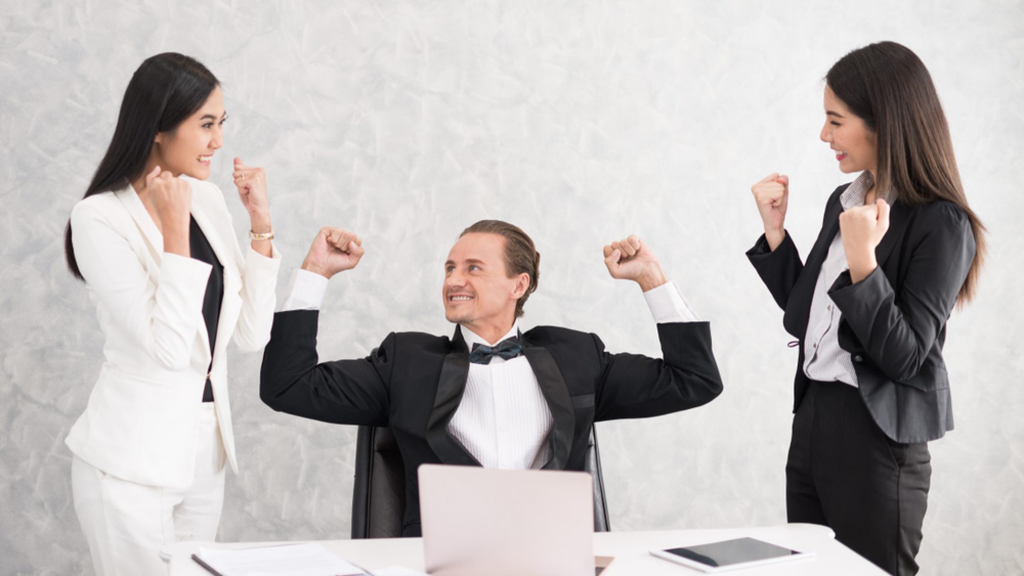 Celebrating,Success,Cheerful,Young,People,Looking,Excited.,Successful,Entrepreneurs,And