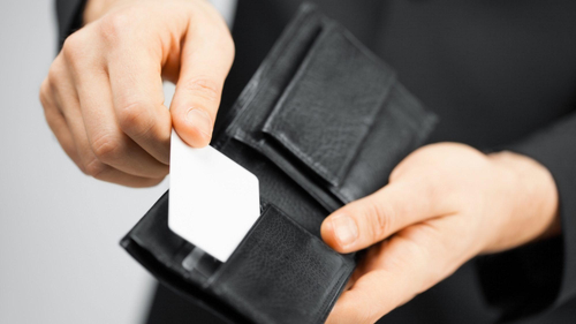 Man,In,Suit,With,Wallet,And,Credit,Card.