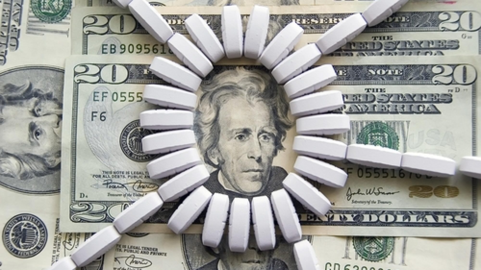 Ring,Of,Light-colored,Tablets,On,U.s.,$20,Bills