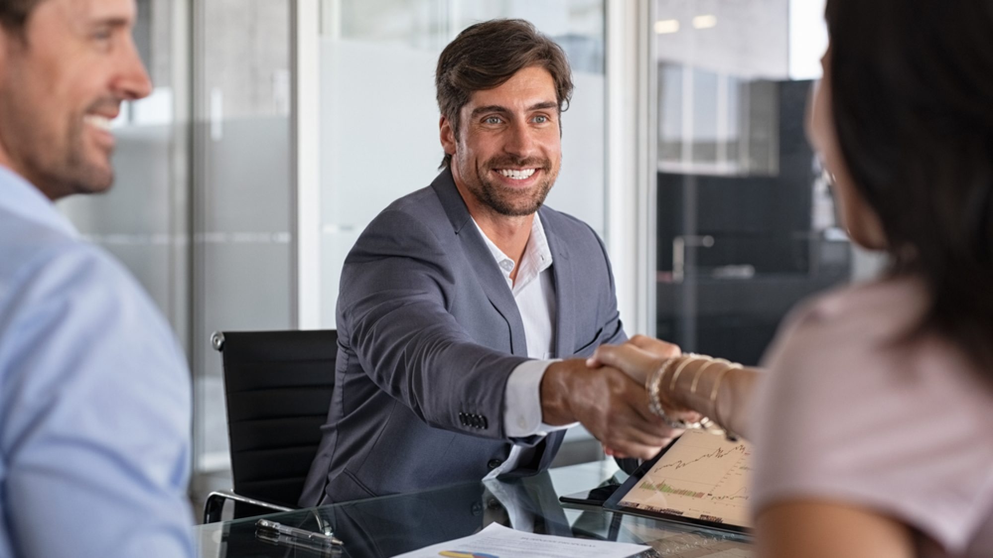 Businessman,Handshake,During,Meeting,,Signing,Agreement,For,Financial,Investment.,Handshake