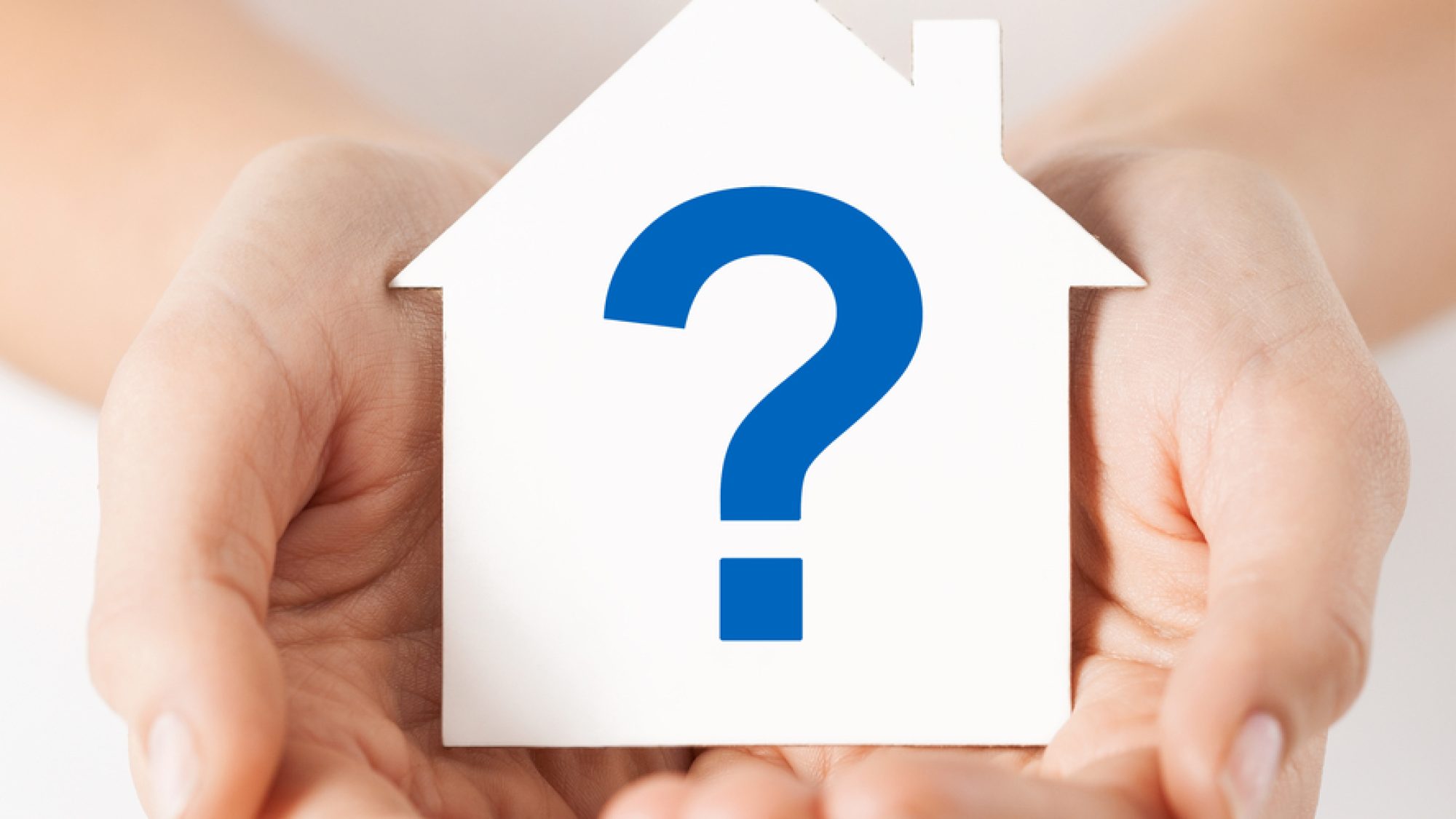 Real,Estate,And,Family,Home,Concept,-,Hands,Holding,Paper