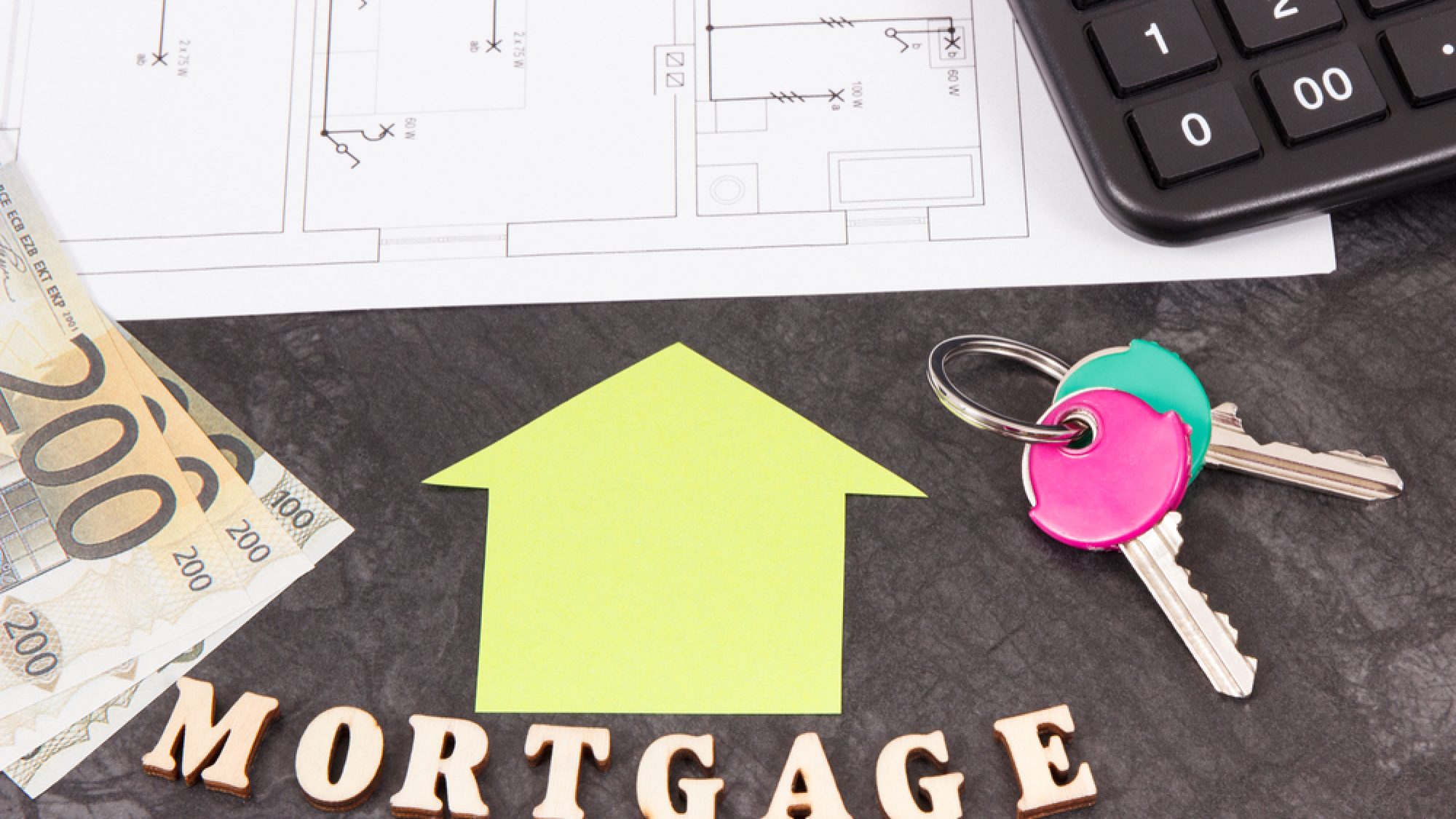 Home,Keys,,Money,,Calculator,And,Housing,Plan,,Concept,Of,Mortgage