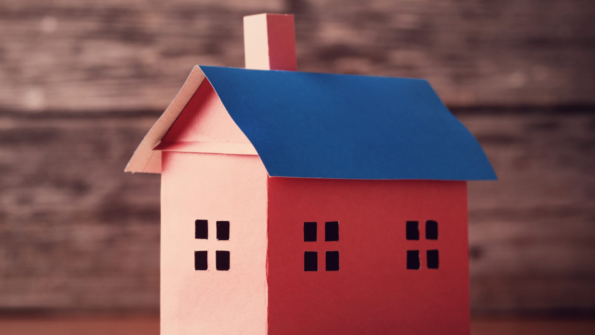 House,From,The,Paper,And,Money,On,Wooden,Background