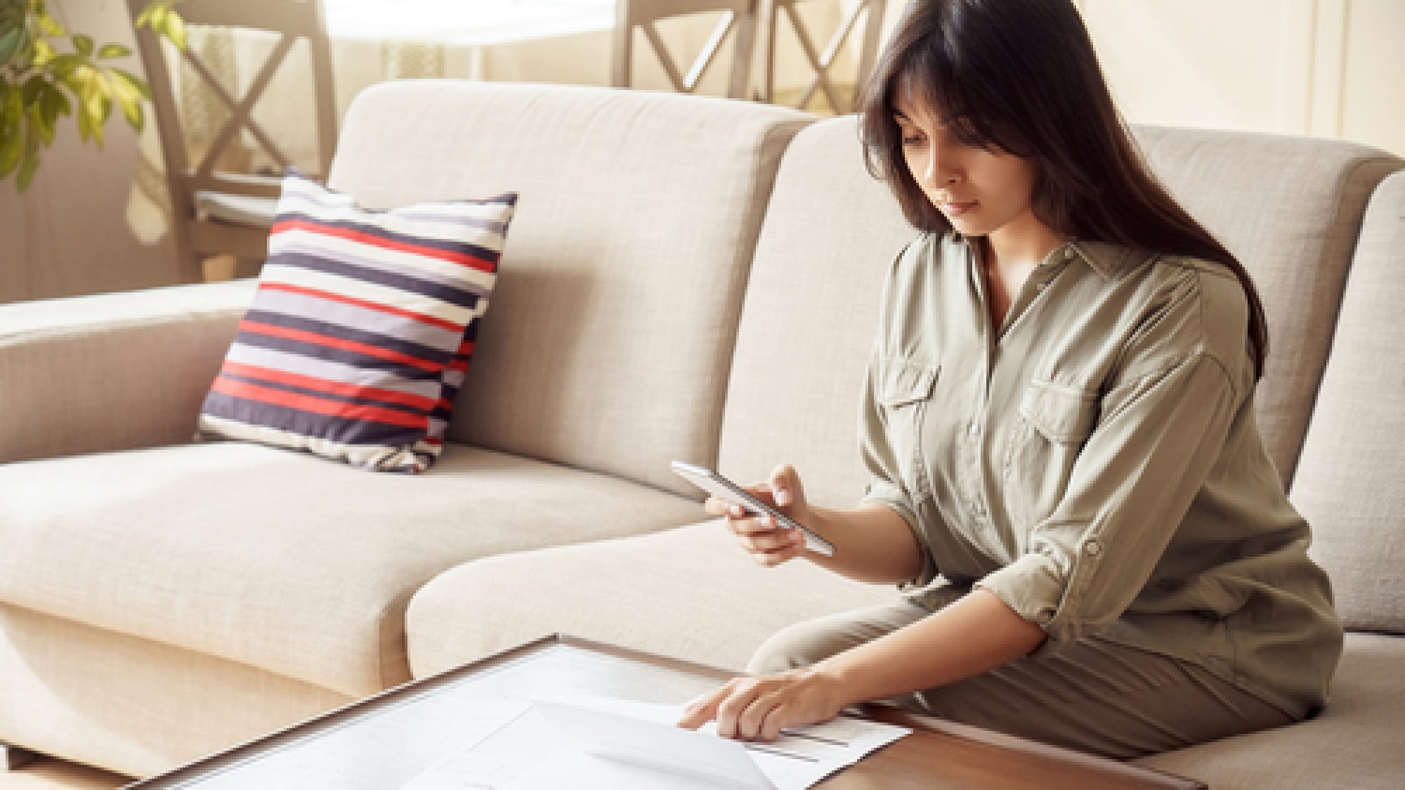 Young,Indian,Woman,Holding,Smart,Phone,Using,Mobile,E-bank,Application