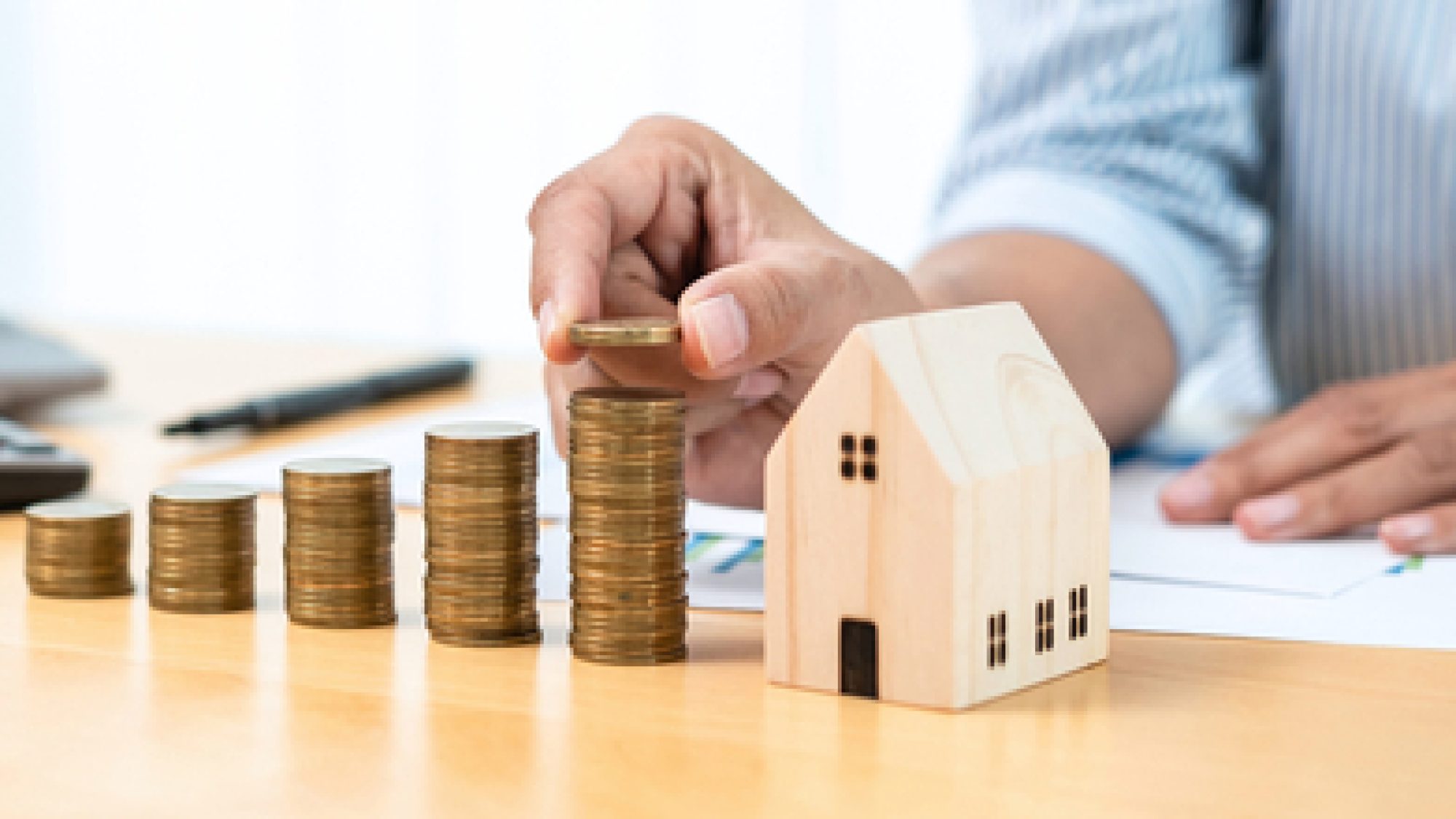 Asian,Business,Man,Putting,Coin,Increase,On,Coins,Stacking,With