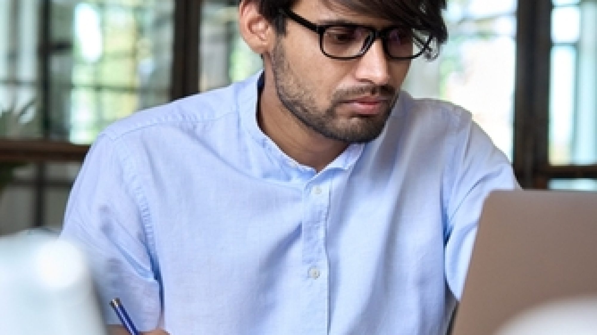 Young,Indian,Businessman,Entrepreneur,Using,Computer,Working,Online,,Doing,Research,