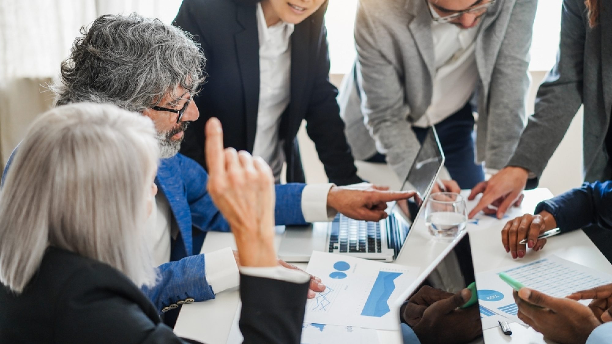 Multigenerational,Business,People,Working,Inside,Corporate,Office,-,Finance,Strategy