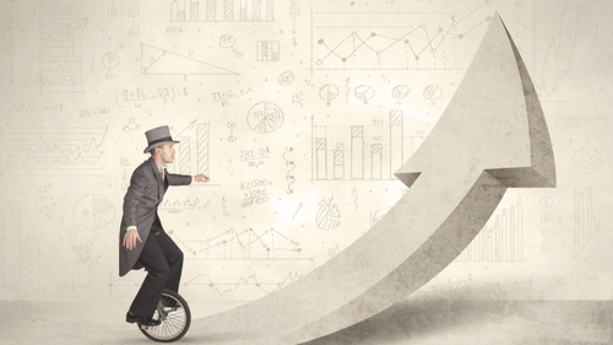 Happy,Business,Man,Riding,A,Monocycle,Up,On,An,Arrow