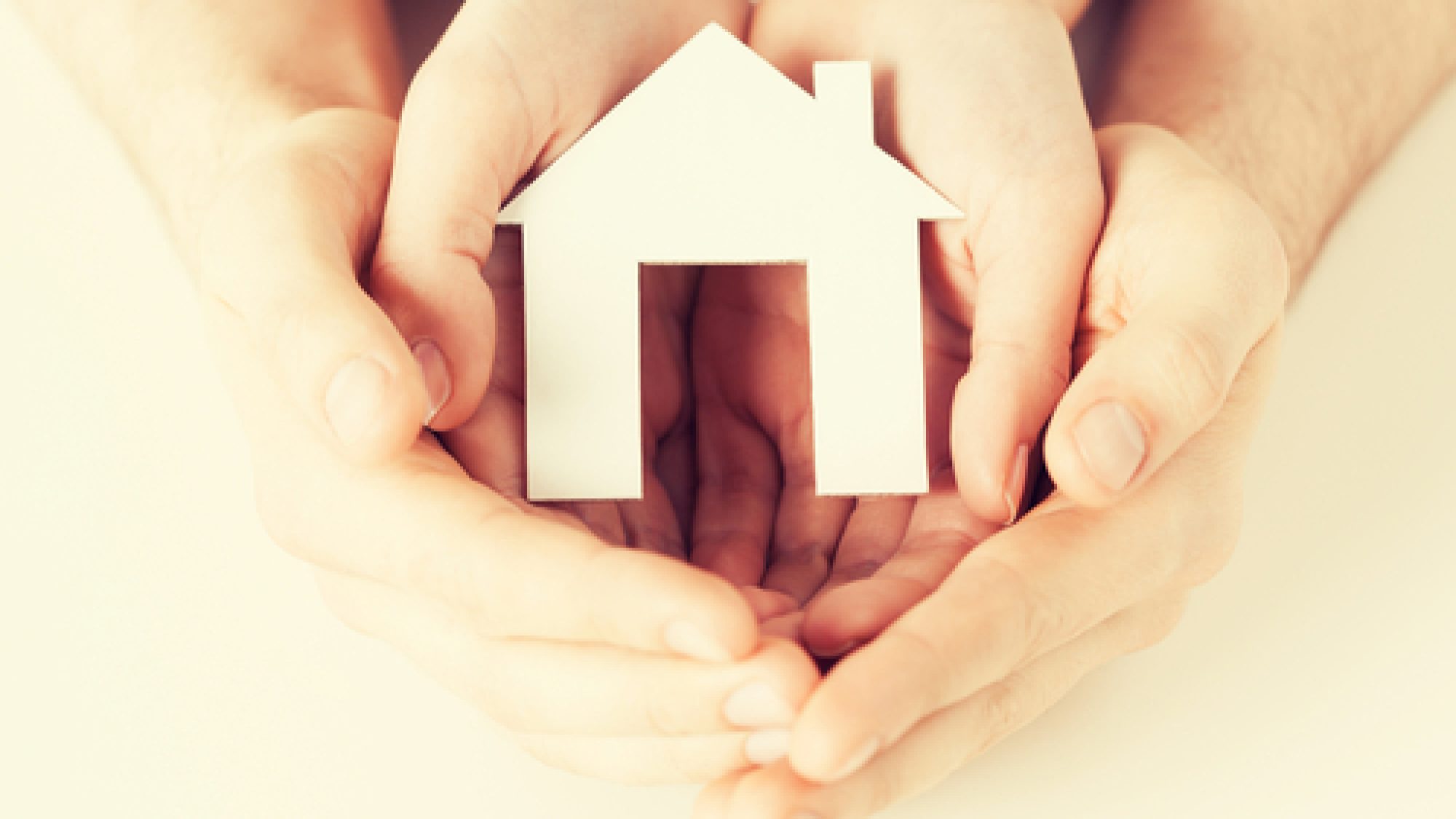 Pisture,Of,Man,And,Woman,Hands,Holding,Paper,House