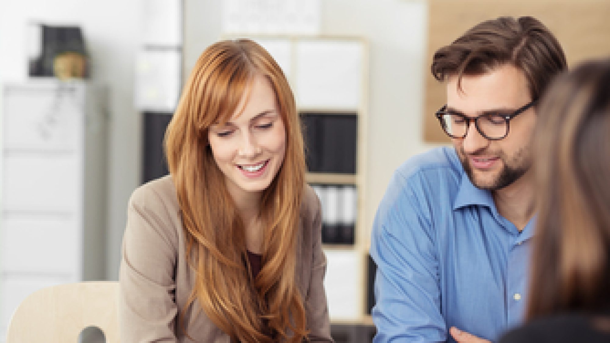 Young,Couple,Sitting,In,A,Meeting,With,An,Agent,Looking