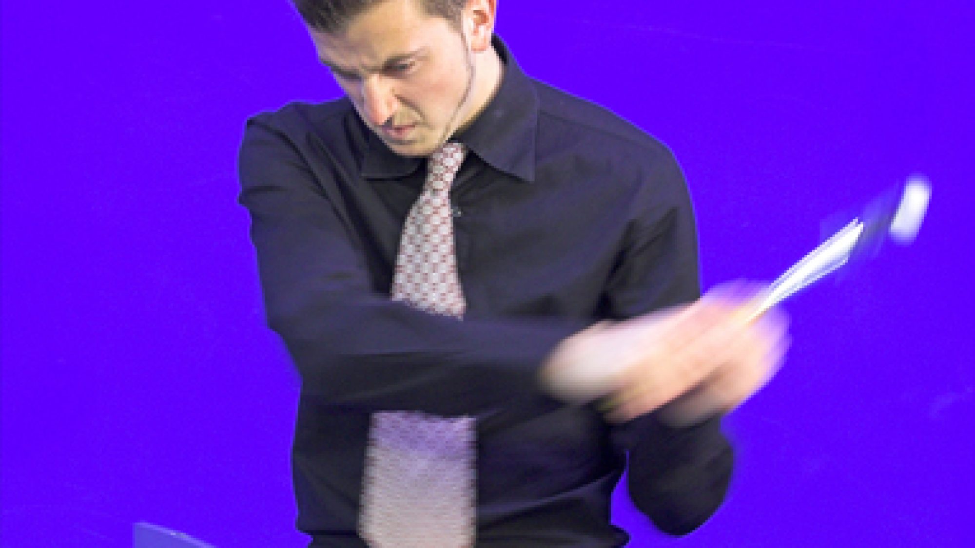 angry business man about to destroy his laptop - focus on his furious face