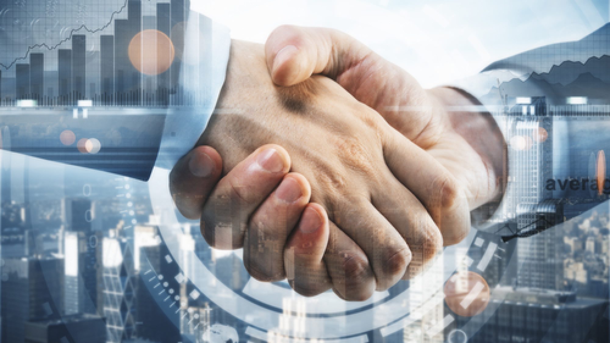 Close,Up,Of,Handshake,On,City,Background,With,Business,Chart.